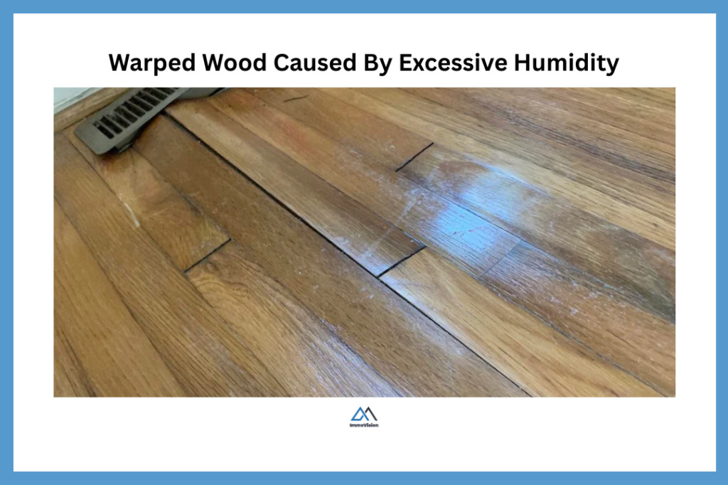 Warped and damaged wooden flooring caused by excessive indoor humidity and moisture buildup in a home.